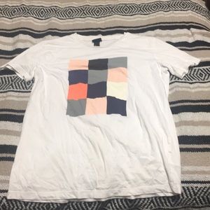 White graphic tee never worn. Perfect condition